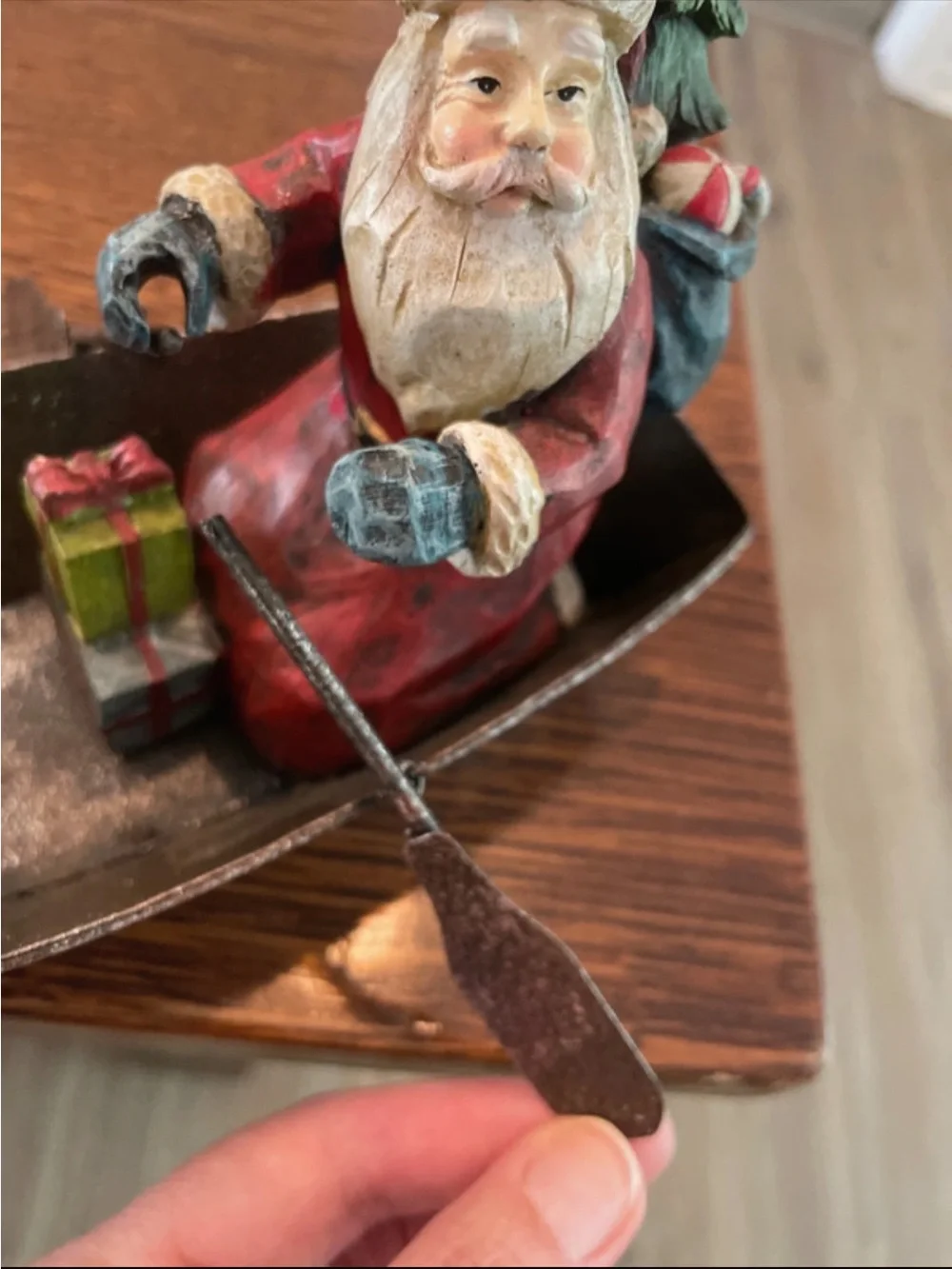 Santa and Snowman in metal fishing boat